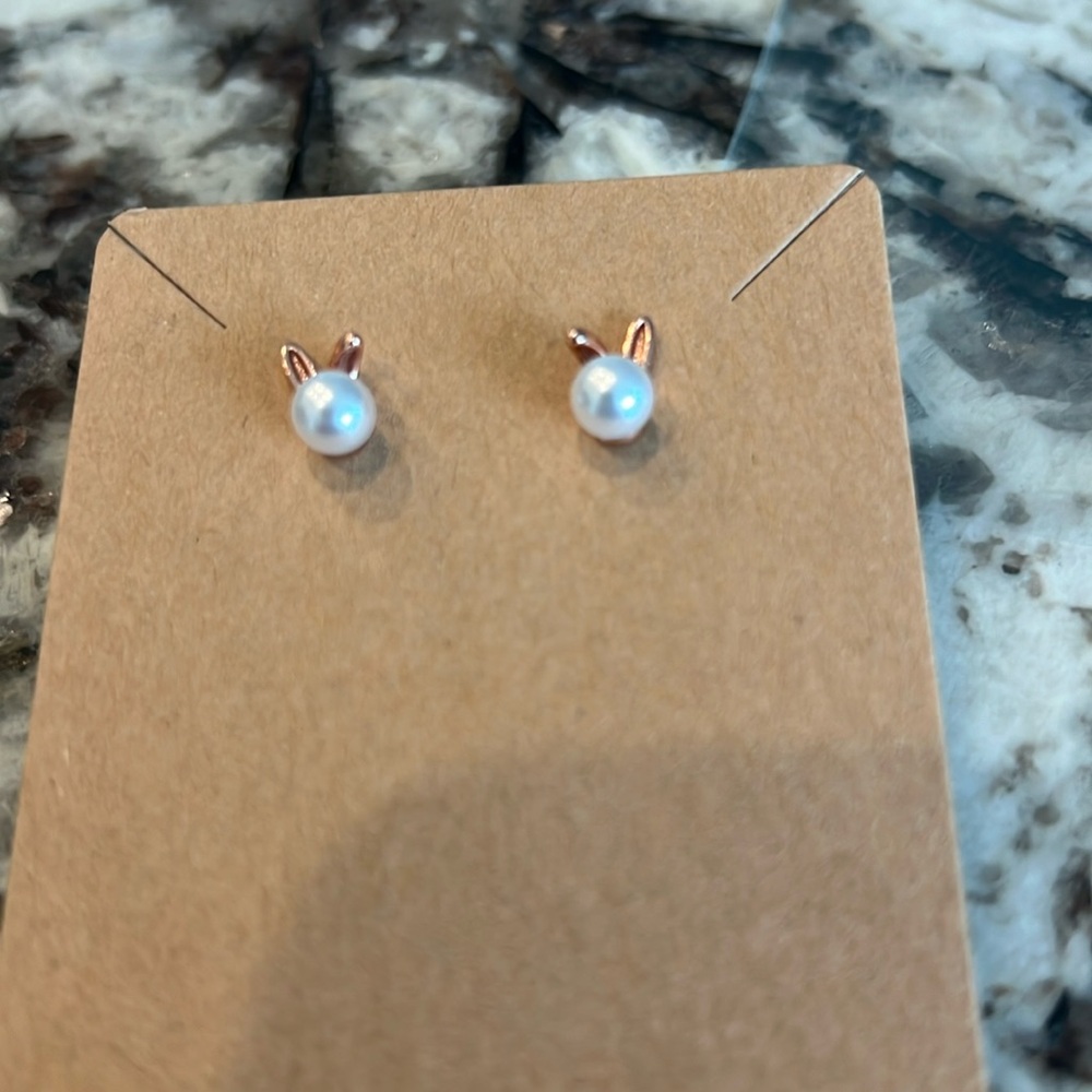 Rose gold colored bunny pearl earrings